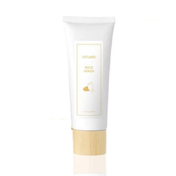 Bottle of rice wash placed on a flat surface with a pump dispenser.