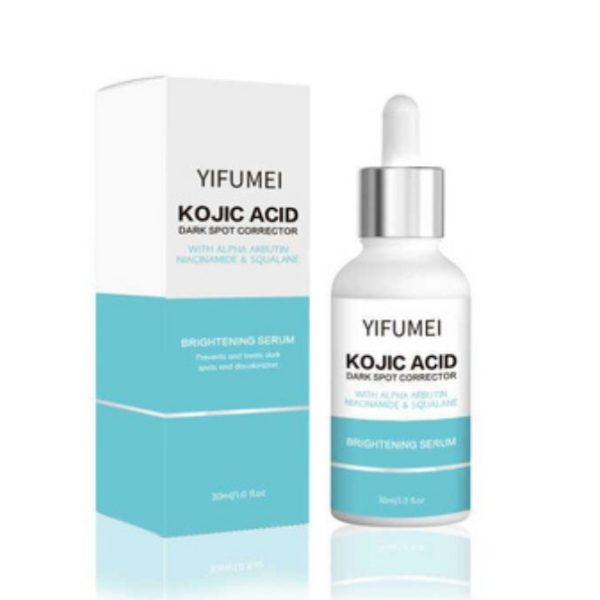 Bottle of kojic acid serum with a dropper placed on a flat surface.