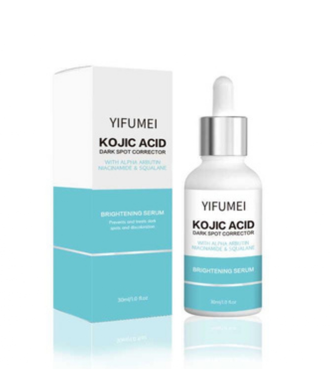 kojic acid serum Bottle of kojic acid serum with a dropper placed on a flat surface.