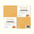 Turmeric cream in a jar with a smooth texture.